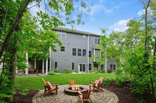 This angle highlights the firepitâs proximity to the under-deck patio and sliding door entrance at the walkout level.