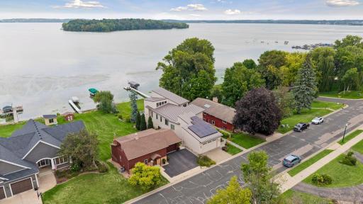 Steel roof with solar as supplemental, real stone accents on entire exterior base of home more! Buyers will love this walkout rambler walkout masterpiece! Beautiful architectural design home with 2 additional office spaces and HUGE storage.