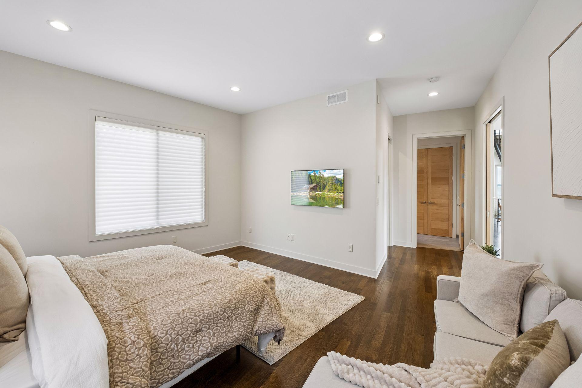 View towards primary suite walk in closet, 2nd additional closet and primary bathroom.