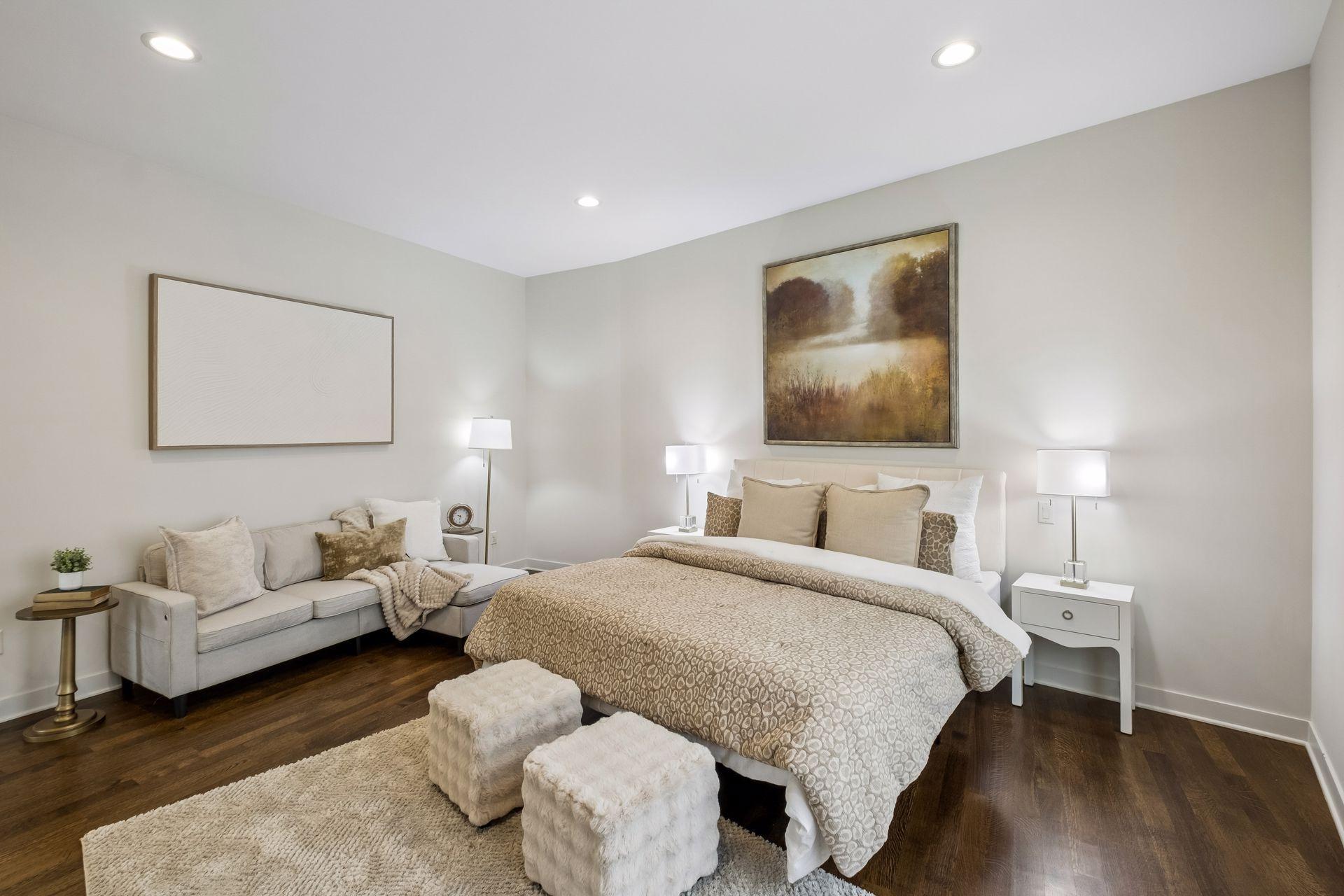 Retreat to your luxurious main-level primary suite, a serene escape designed for rest and relaxation. Spacious and inviting, this private sanctuary offers the perfect place to unwind after a day on the lake and wake refreshed to another beautiful day