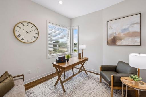 Balance work and waterfront living in this inviting main-level office. Natural light and lake views create an inspiring space to focus, dream and create, while keeping the beauty and tranquility of lake life just outside your window