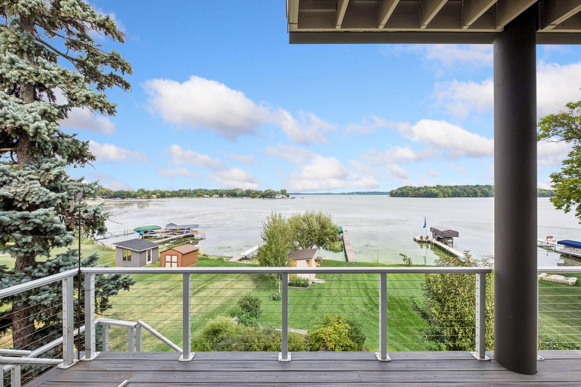Step onto your main-level deck and embrace the magic of lake living. Take in panoramic water views, gentle breezes and unforgettable sunsets as boats glide by. The perfect setting for morning coffee, evening cocktails and making memories on the water