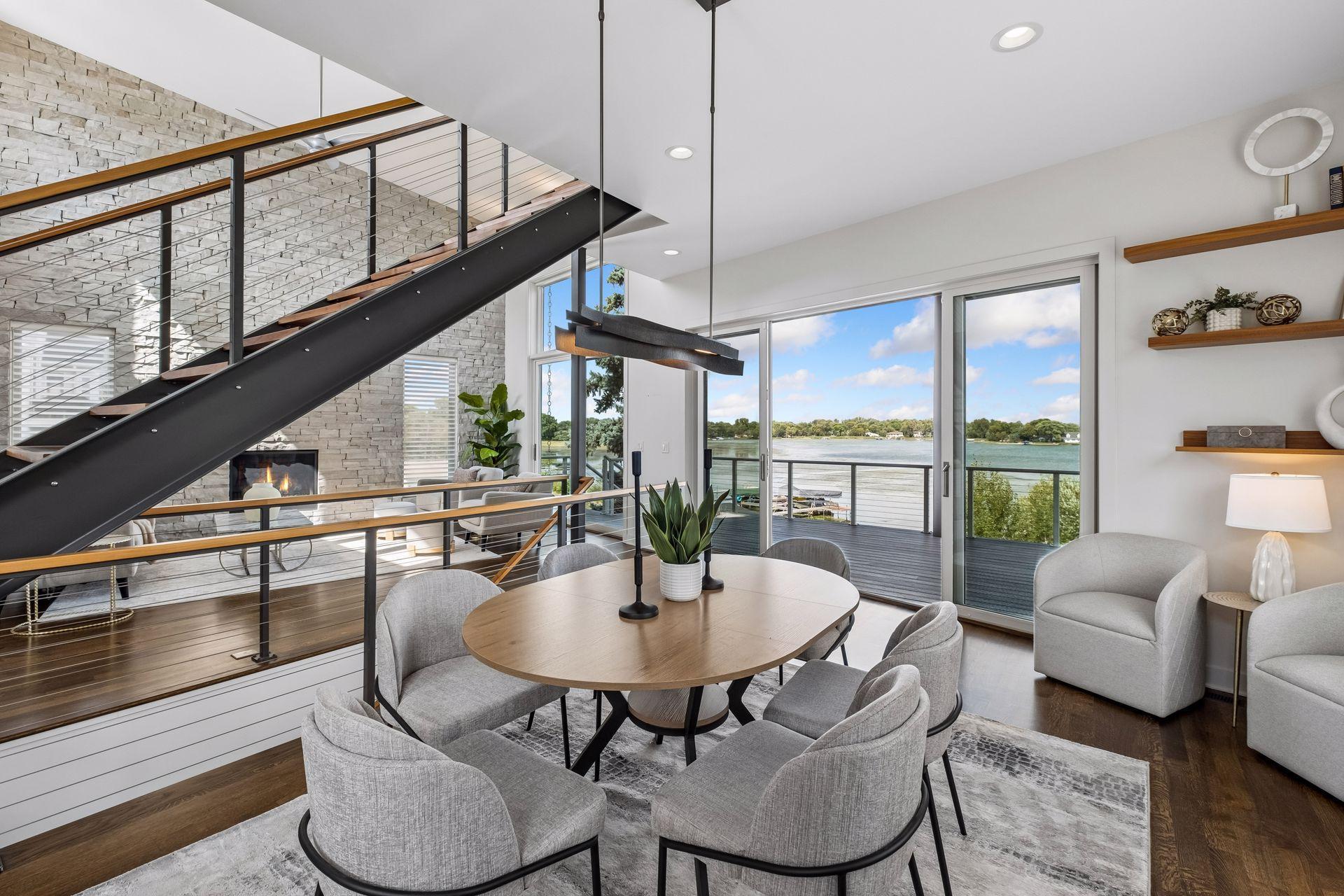 Picture yourself sitting here taking in the lake life year-round or seasonal if you desire. Gorgeous stone wall in main level living, soaring 16-foot ceilings, incredible architecture to enjoy in your new lake home.