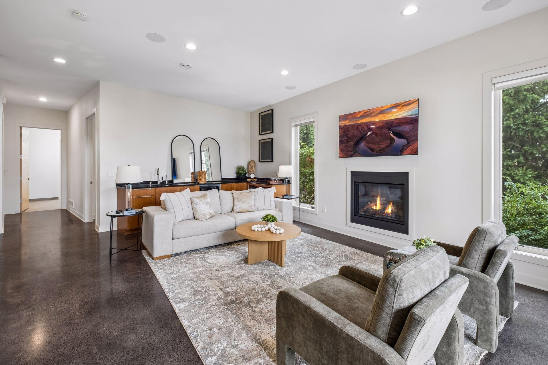 Gather around the fireplace, serve drinks from the wet bar and create lasting memories with family and friends in this inviting lower-level retreat. In-floor heat delivers exceptional comfort and efficiency, making every season cozy and welcoming.