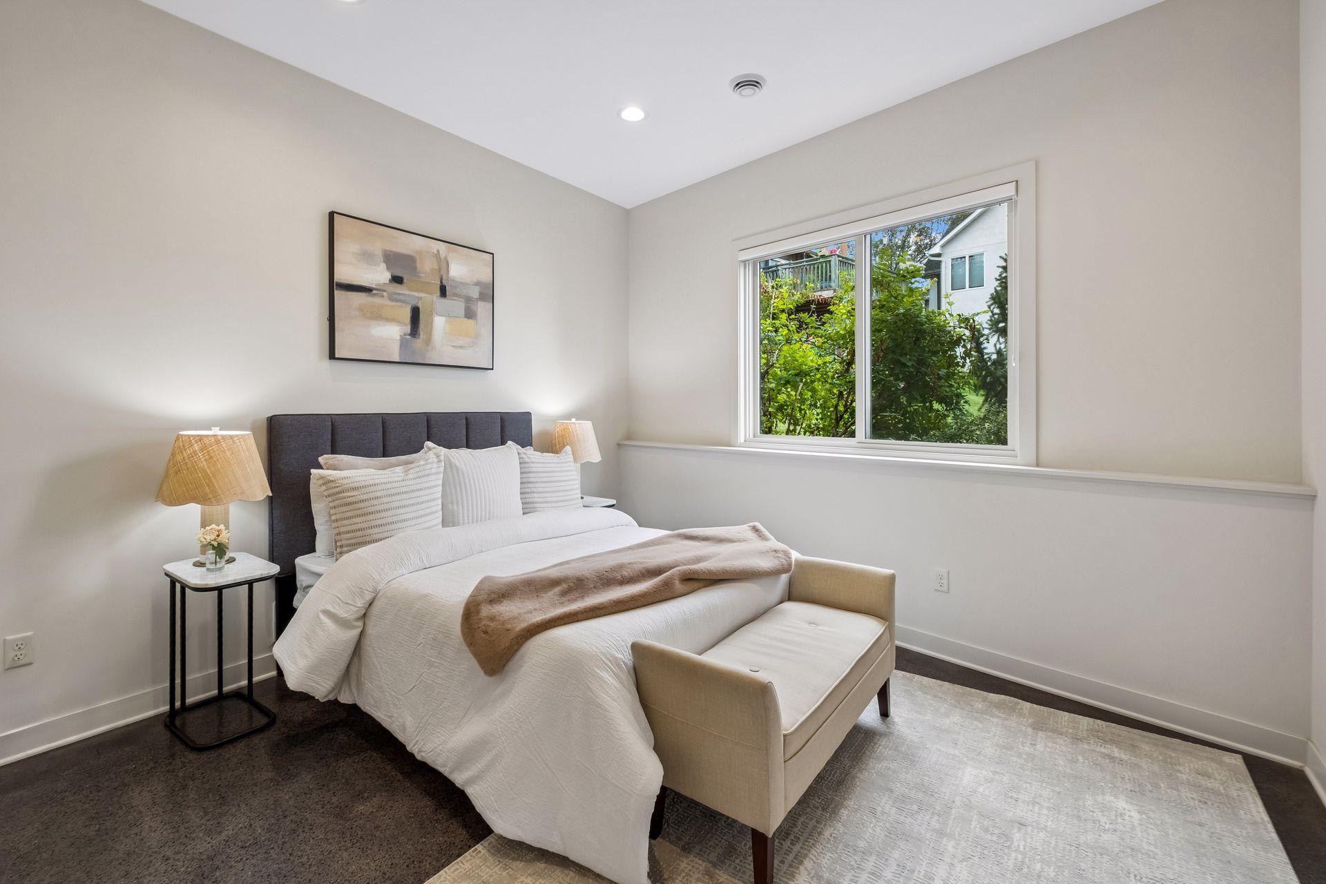 Tucked away for peaceful rest after a day on the water, this inviting lakeside bedroom offers comfort, privacy and relaxation. A serene retreat for family or guests to recharge and wake refreshed for another day of lake adventures and sunset memories