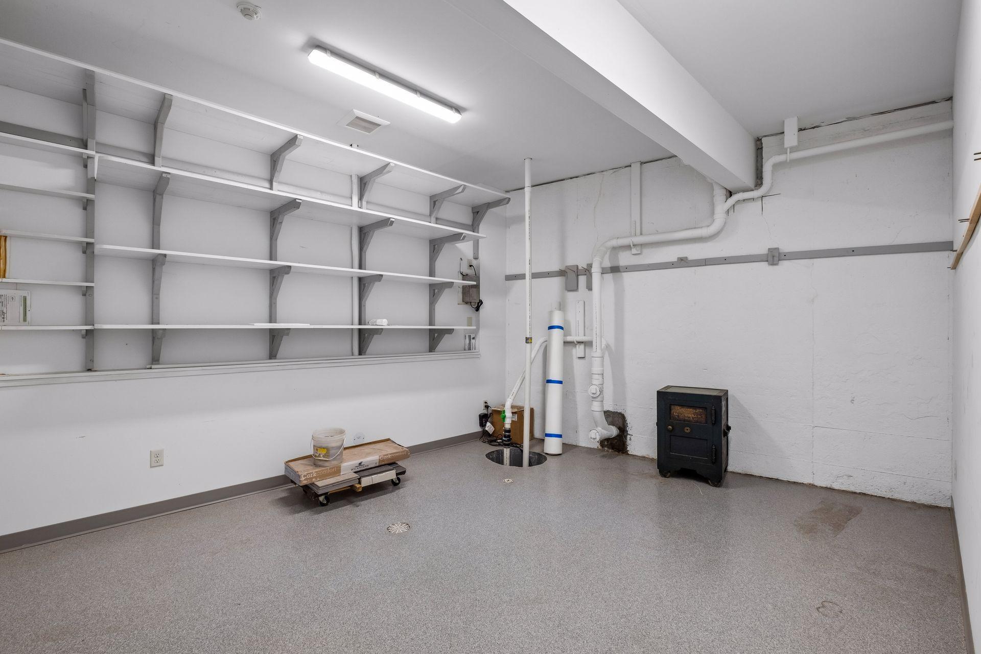 Additional storage room over and above the spacious utility room not pictured. Door for direct access to the outside for easy lake access. Store all your boating items, fishing gear, kayaks, and more.
