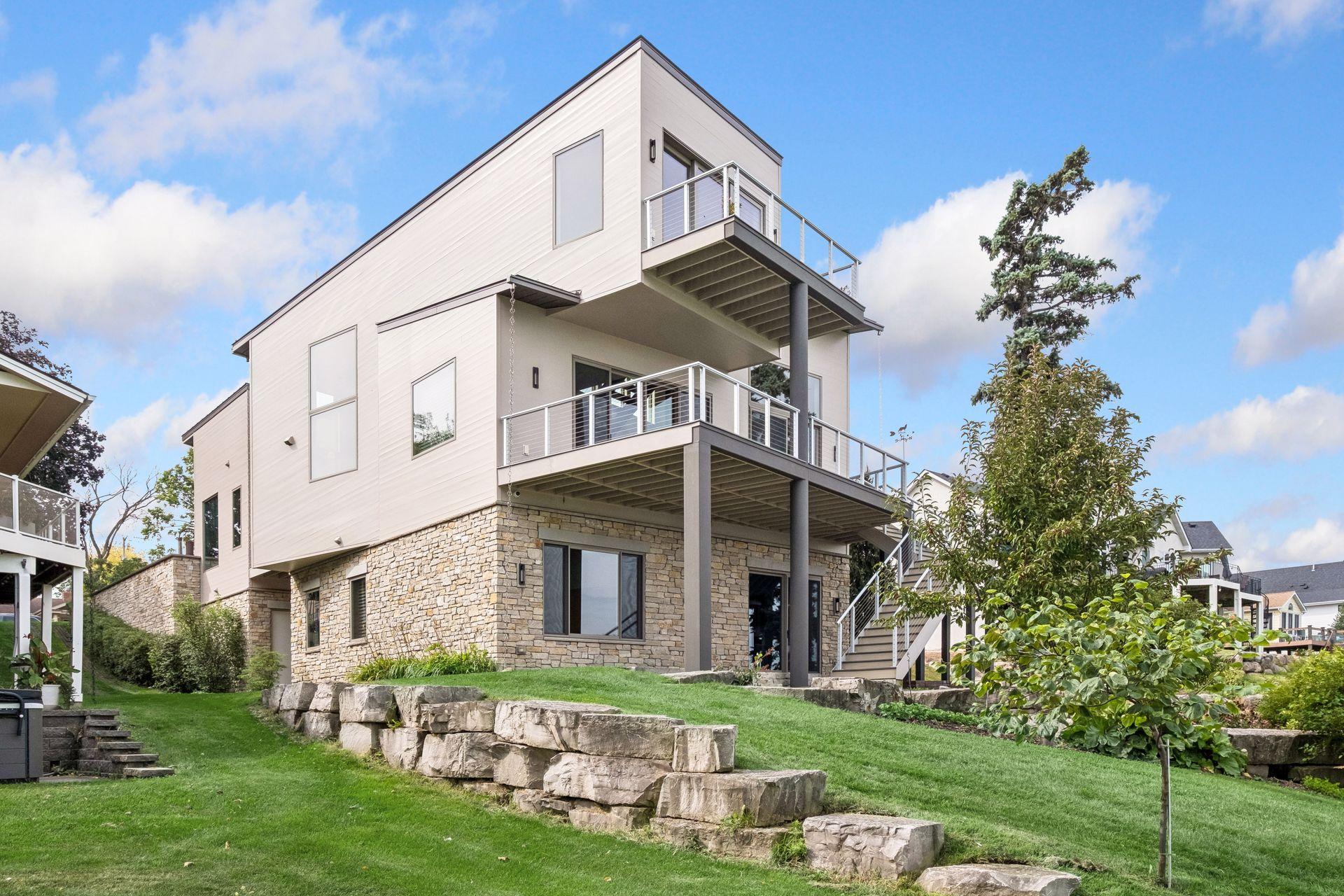 Real stone surrounds the base of the home. Two decks for lake entertaining or simply relaxing.