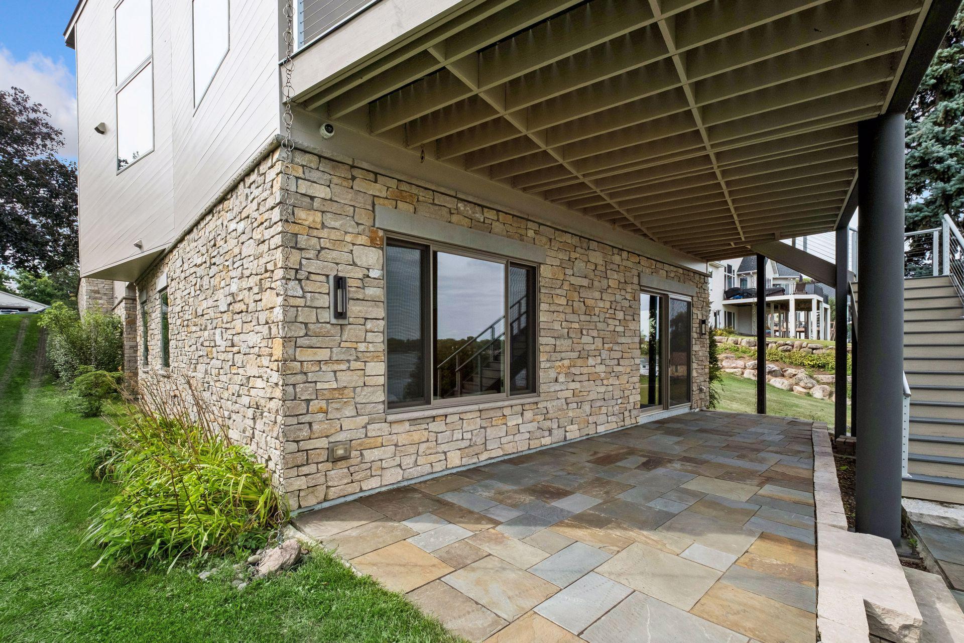 Lower-level patio awaits moments to share and memories to be made at the lake.