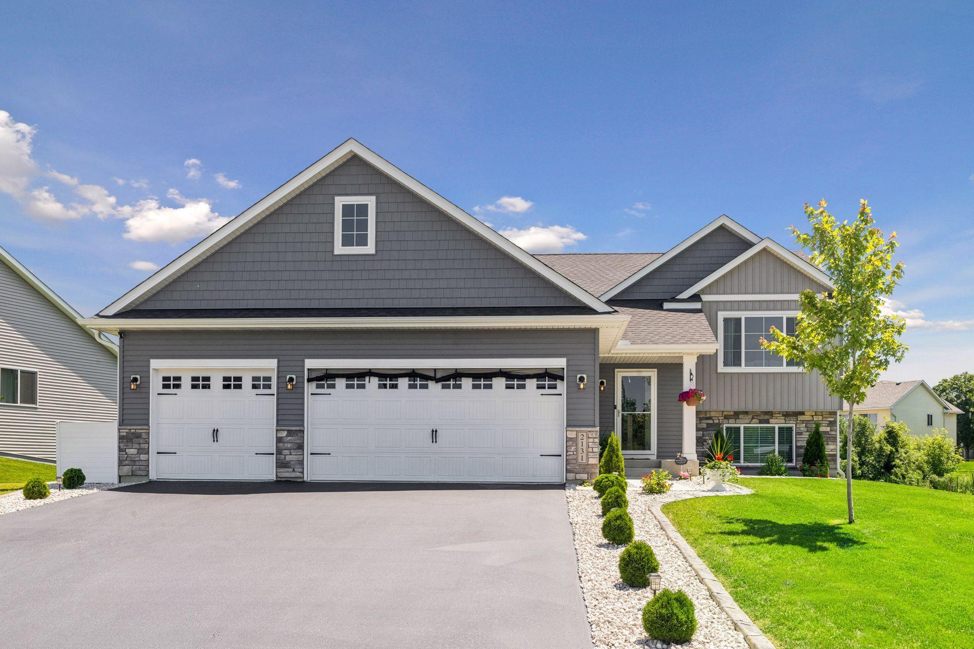 Beautiful home awaits new buyer. Stunning inside and out with gutters, heated garage, new flooring throughout, carpet, lighting and more! Ideal flat backyard with chain link fence that is new.