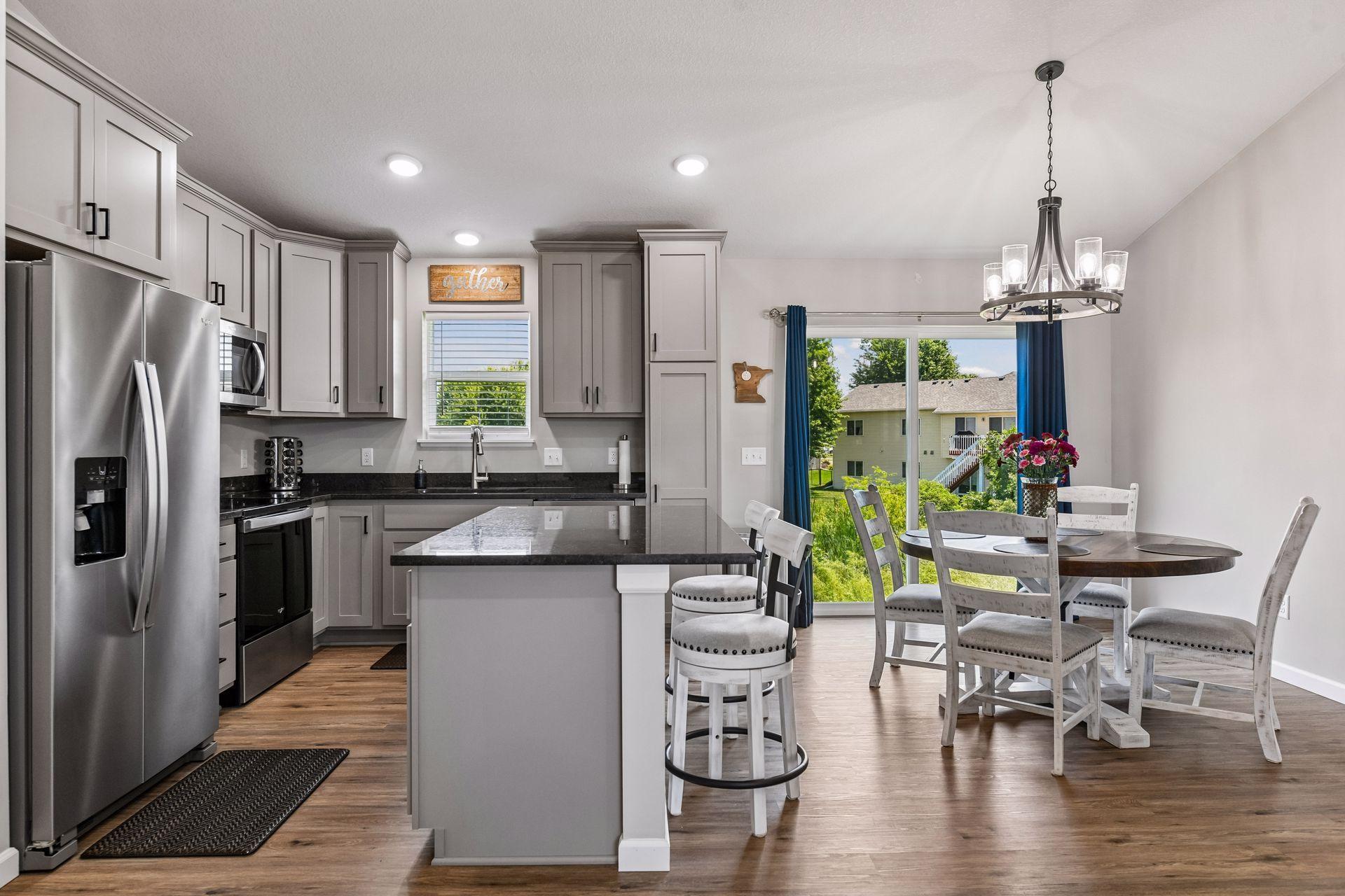 Custom cabinetry with granite counters. Gas line is run if buyers prefer a gas range.