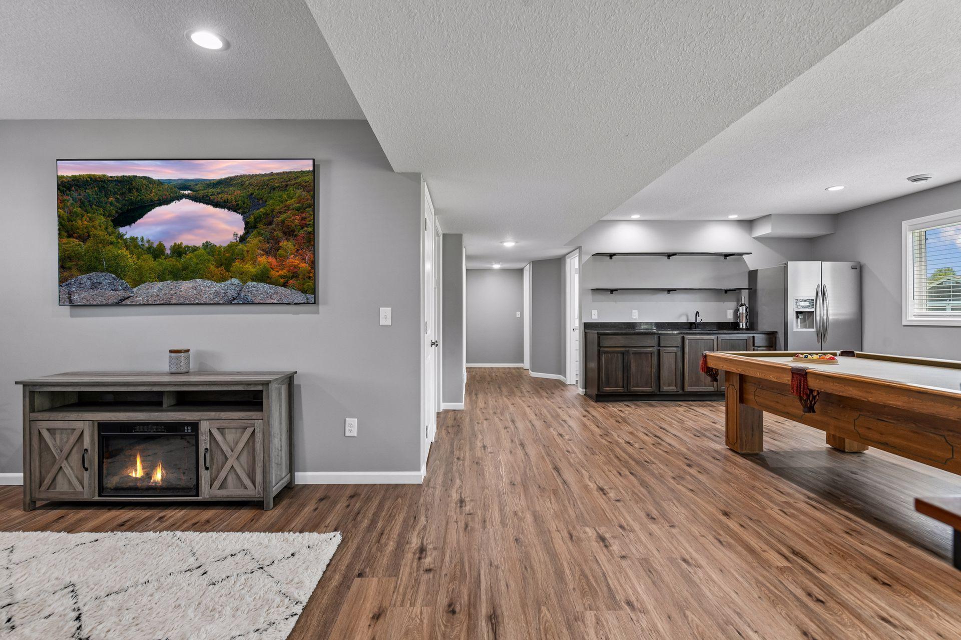 View towards 2 additional lower-level spacious bedrooms and full bathroom.