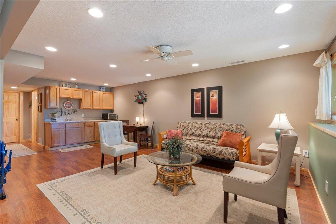 The lower-level family room and bar offer a fantastic space for entertaining and hosting guests