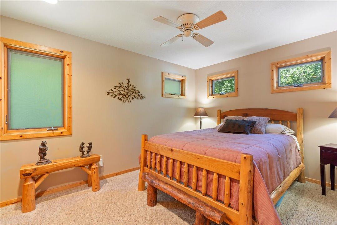 The main level primary bedroom has great natural light and plenty of closet space