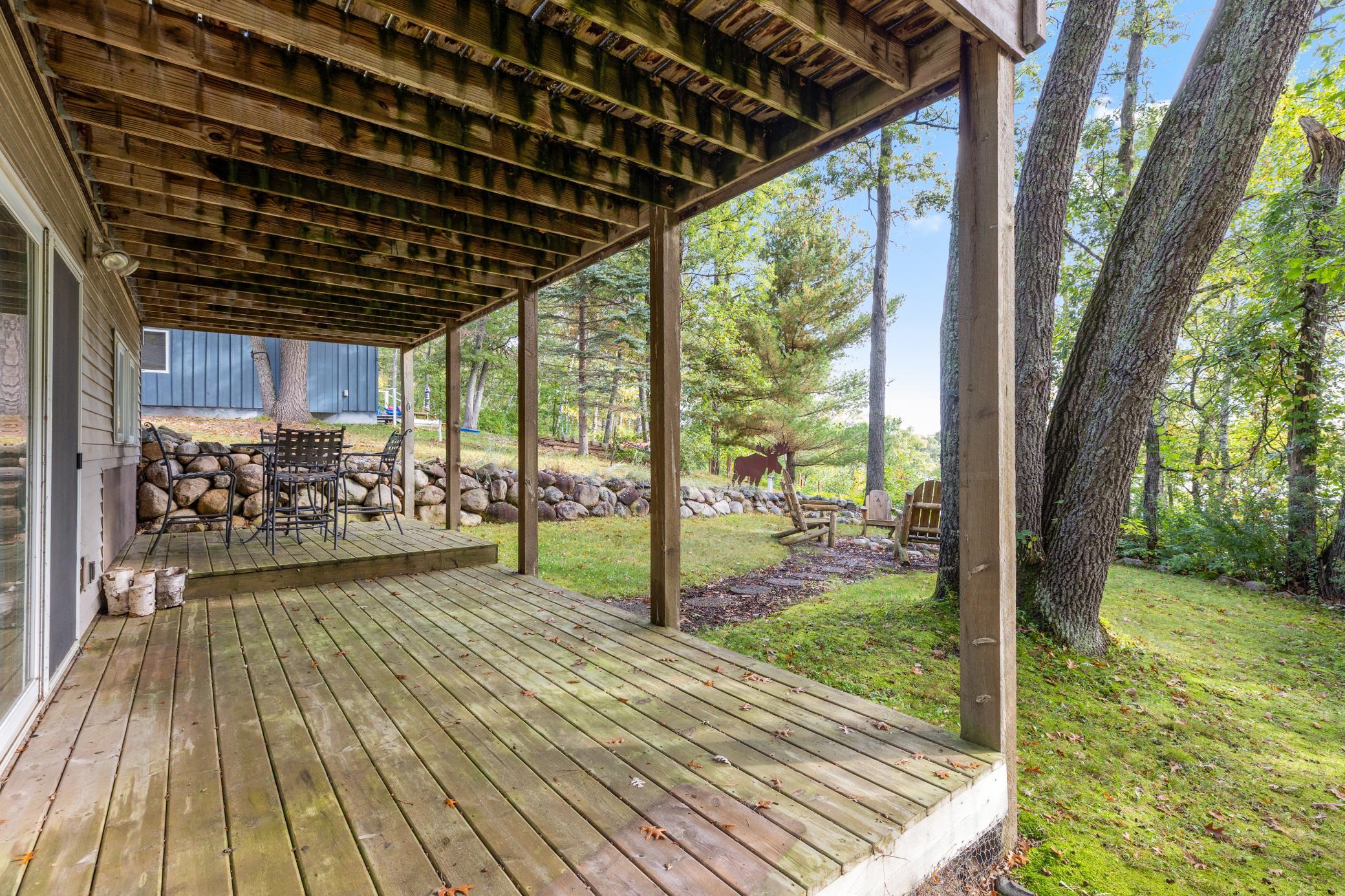 A large lower level covered deck offers an additional space to enjoy the outdoors