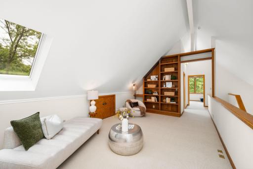 3rd Floor loft with custom built-in bookcase.