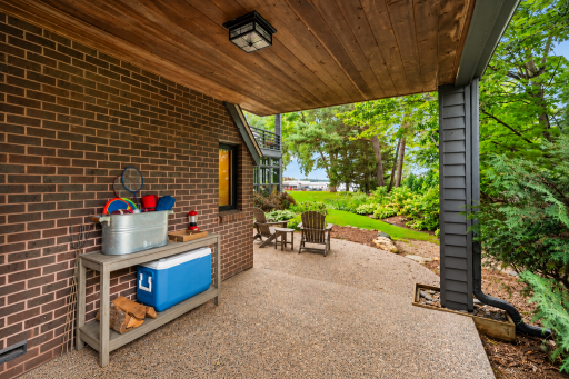Main floor patio large enough to entertain your favorite peeps, offer optional dining with the fam, or simply relax and take in the air and the soothing sounds of water greeting the shores of Smithtown Bay