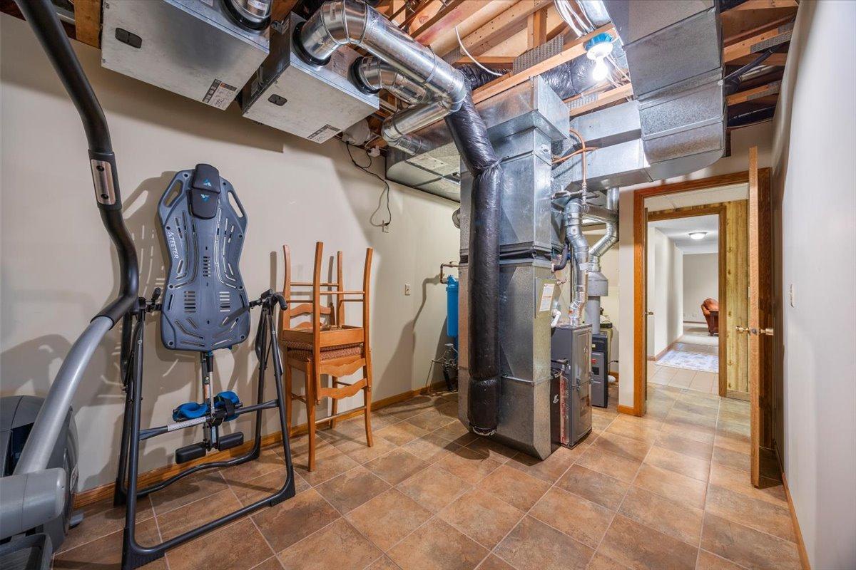 Utility room protected with fire suppression system