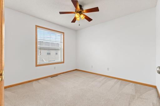 Comfortable secondary bedroom space for guests, hobbies or working from home.