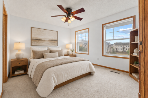 Virtually staged—a peaceful primary bedroom with room to truly unwind.