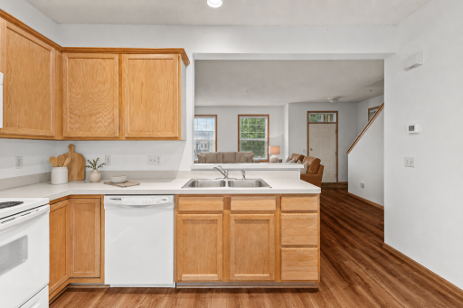 A functional kitchen with generous cabinetry, ample counter space and room to gather.