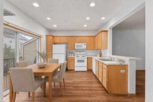 Virtually staged—an open kitchen, dining and living layout designed for effortless everyday connection.