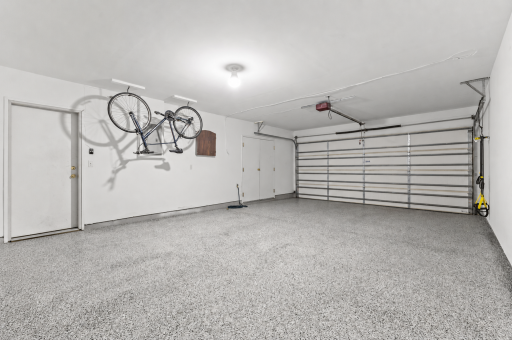 A finished two-car garage offers protected parking, storage and valuable space for Minnesota living.