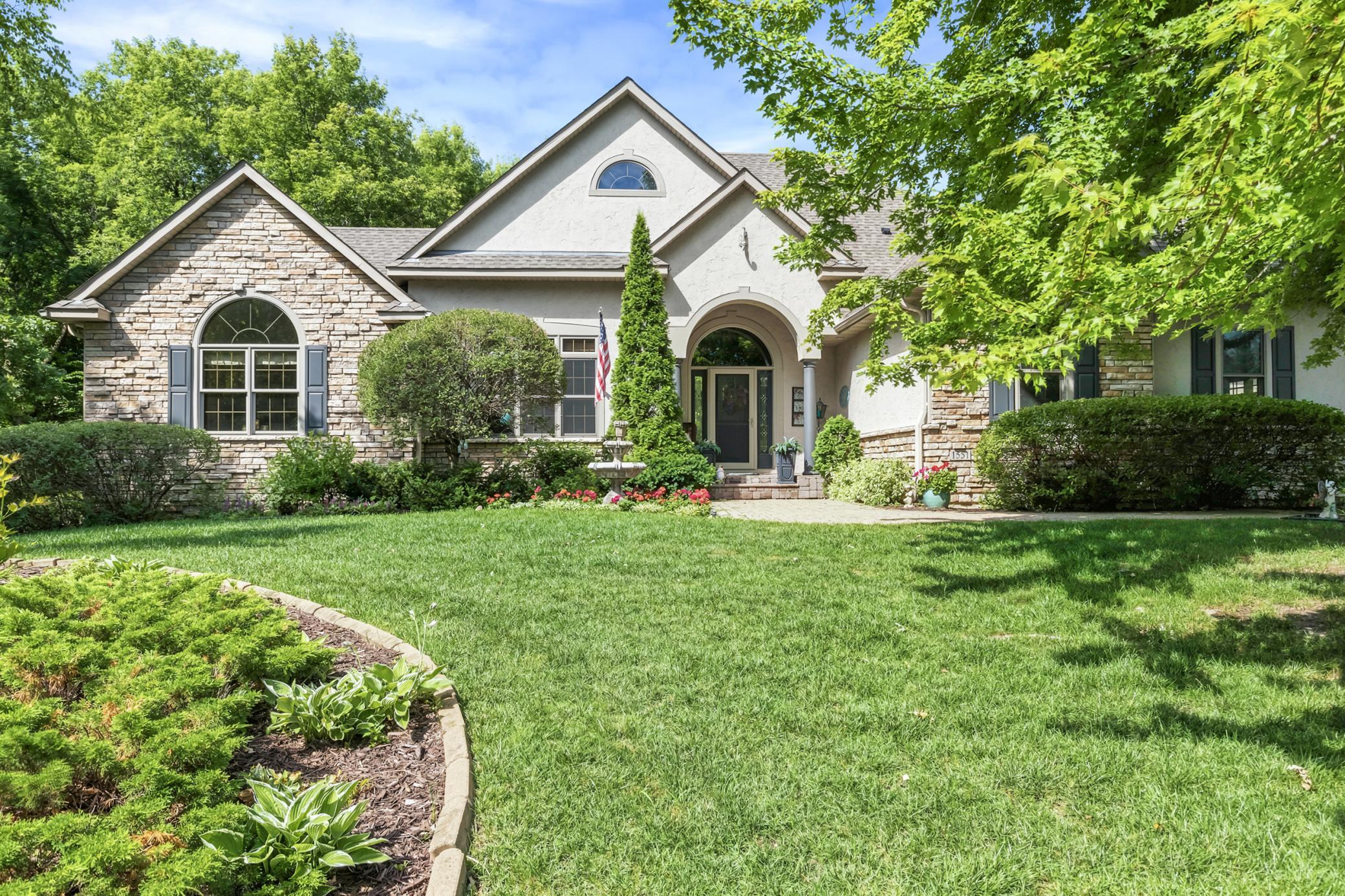 Front landscape includes fountain