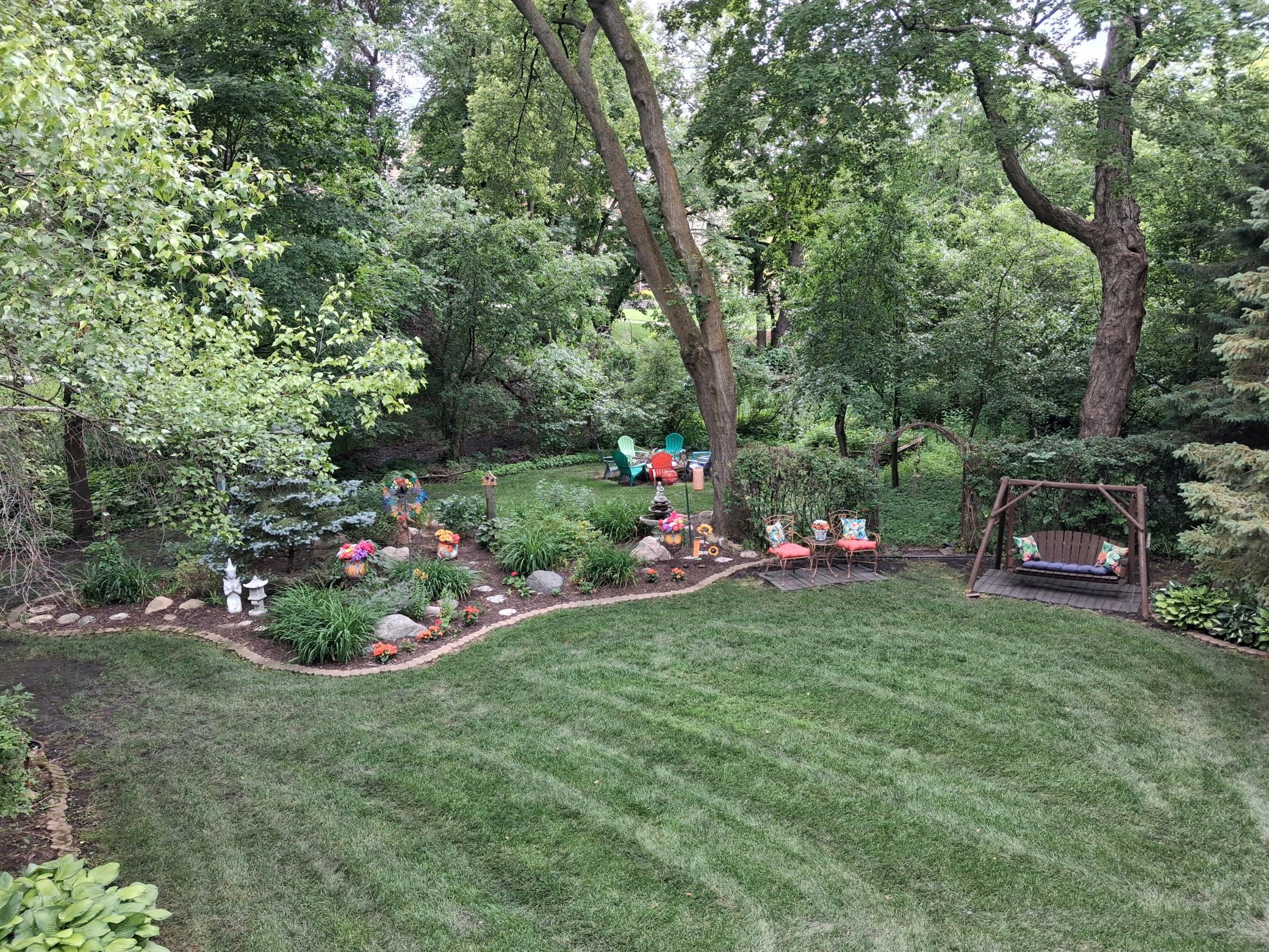 Yard swing amoung the gardens