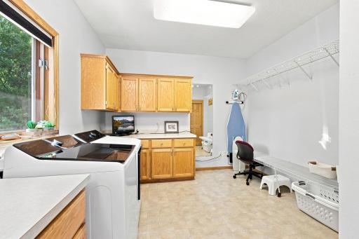 Exceptional storage, workspace, and organization in the laundry room.