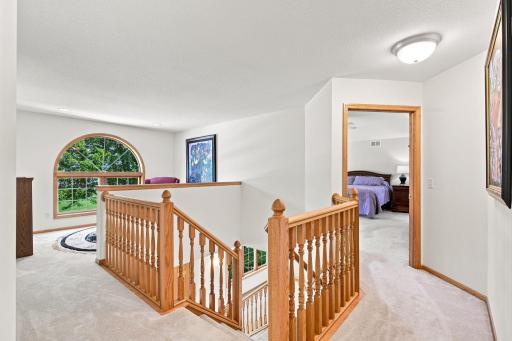 Spacious upper loft, ideal for a reading nook or second living area.