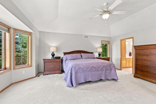 Tons of natural light in a large primary bedroom