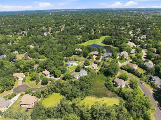 Located in a prestigious executive neighborhood surrounded by custom homes, mature trees, and scenic natural beauty. Enjoy a peaceful setting while remaining conveniently close to shopping, dining, schools, parks, and everyday amenities.