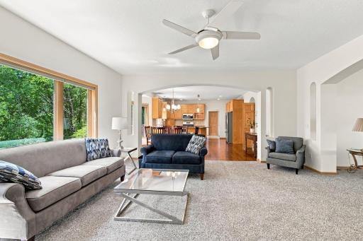 Open-concept layout creates effortless flow between the family room and kitchen, ideal for everyday living and entertaining.