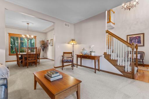Sitting room located off of the foyer, a flexible space for a home office, playroom, or reading nook.