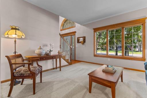 Step into a bright foyer with rich oak flooring.