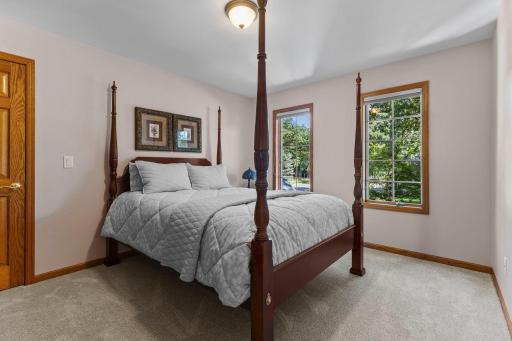 Fourth bedroom welcomes bright front yard sunshine daily.