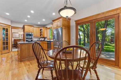 Informal dining area flows straight to the patio for easy indoor outdoor living.