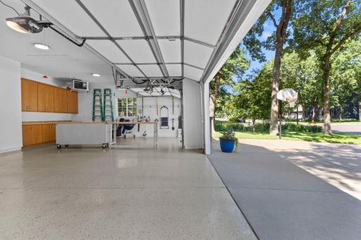 Fully heated and insulated, featuring built-in cabinetry and a dedicated workspace.