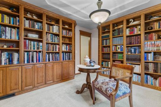 Built-in bookcases line the walls.