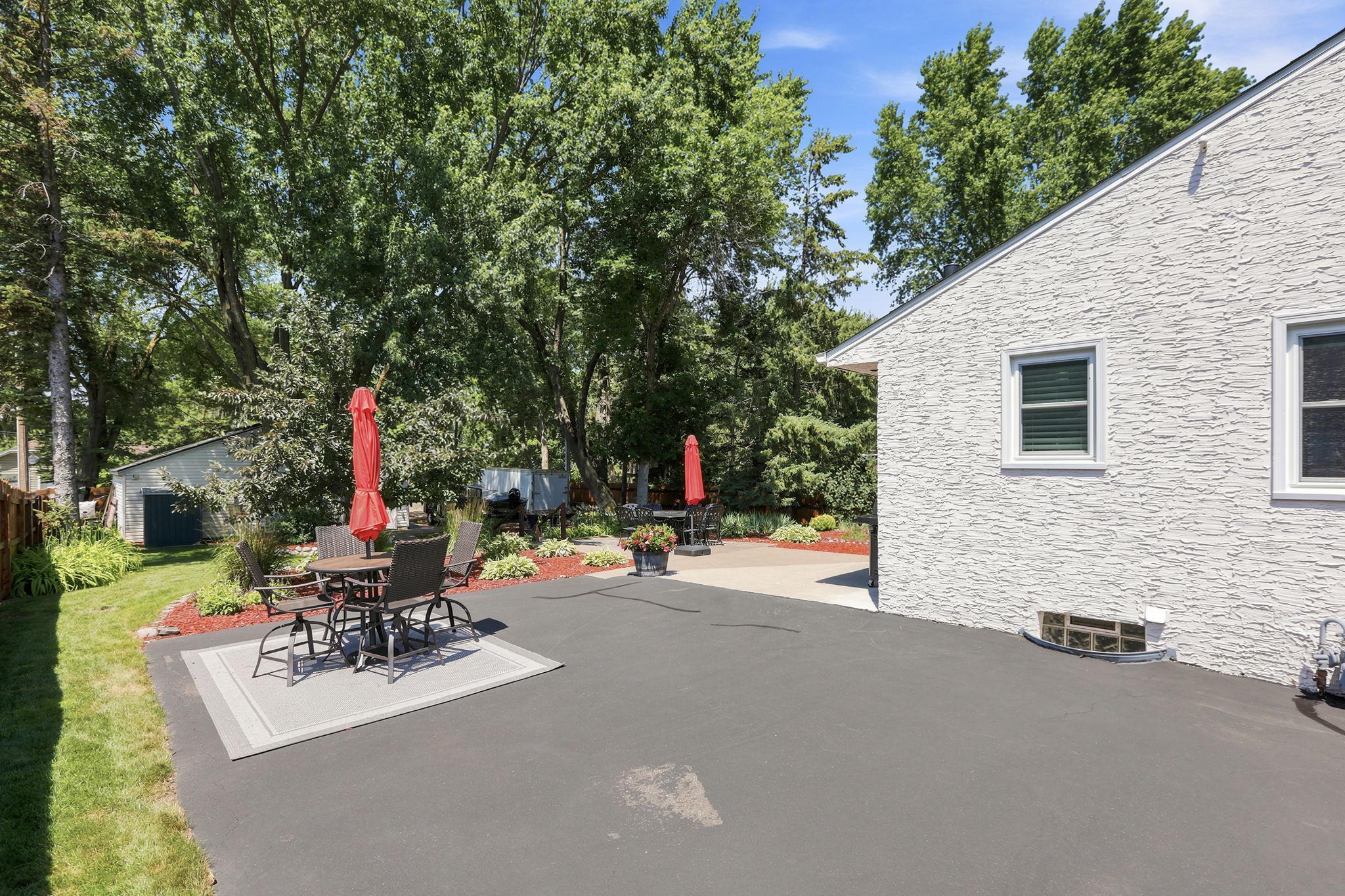 Enjoy a fenced yard with a gated driveway and a large patio perfect for entertaining!