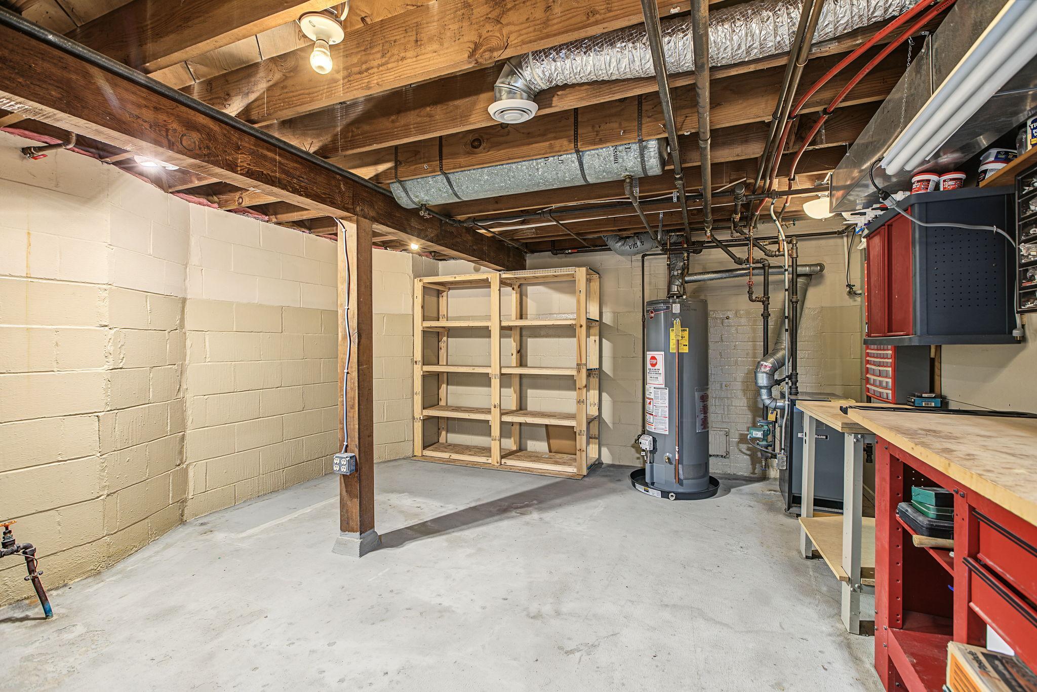 Alternate view of storage area. Water heater was replaced in 2020.