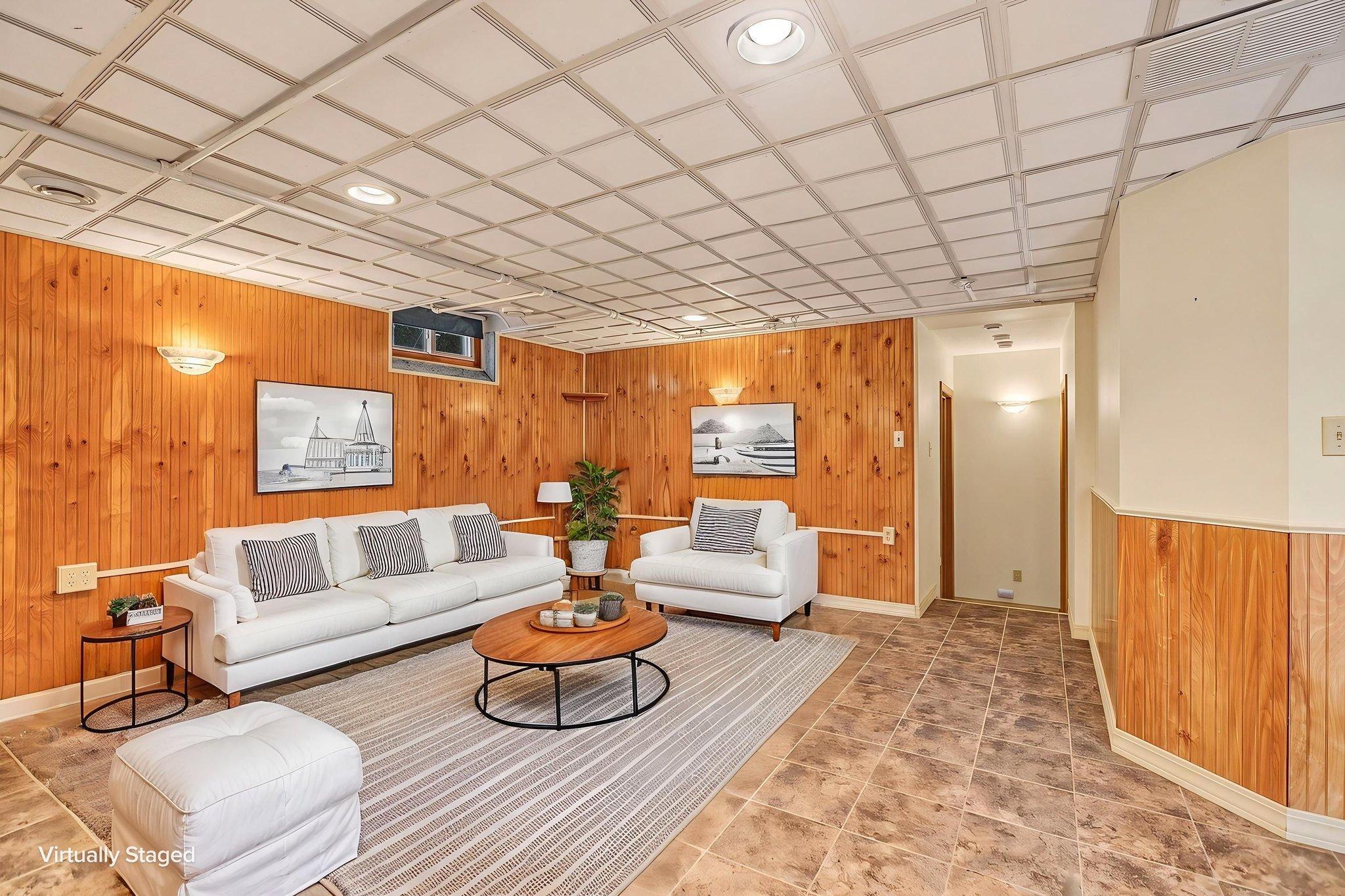 A second option for furniture arrangement in the lower level family room. Just down the hall are 2 more bedrooms that were added when the main floor addition was completed.