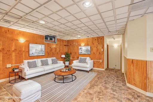 A second option for furniture arrangement in the lower level family room. Just down the hall are 2 more bedrooms that were added when the main floor addition was completed.