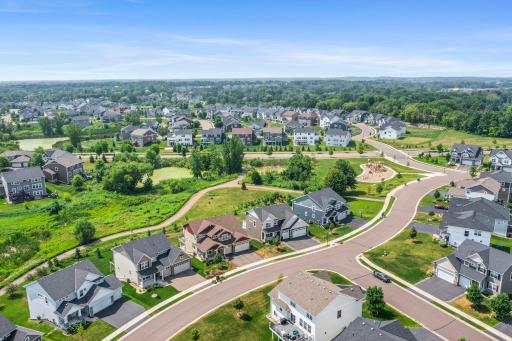 Aerial perspective showcasing proximity to local parks, playgrounds, and scenic wetlands
