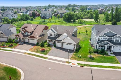 Bird's-eye view detailing the layout of the lot, backyard space, and surrounding homes.