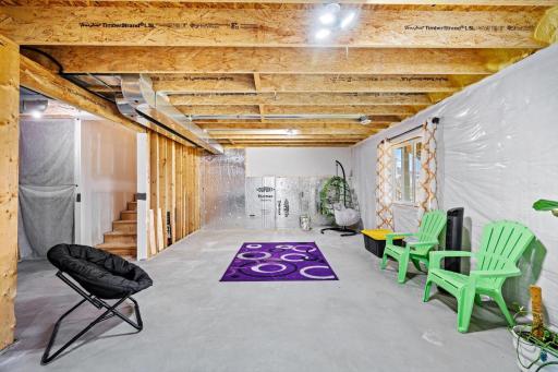 Expansive full lower level with daylight windows and endless potential for future custom finishing or recreation space.