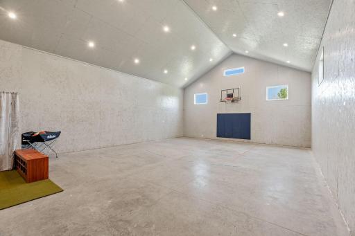 Incredible 35x70 finished Recreation Building featuring INDOOR basketball/sport court, golf zone, gaming & entertainment areas, Kitchenette, Baths, storage/hobby space & room for vehicles, toys or collections