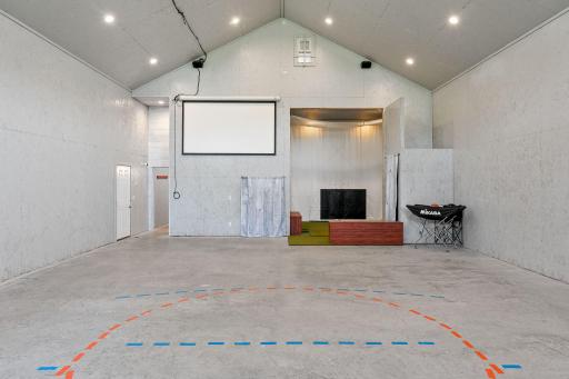 Incredible 35x70 finished Recreation Building featuring INDOOR basketball/sport court, golf zone, gaming & entertainment areas, Kitchenette, Baths, storage/hobby space & room for vehicles, toys or collections