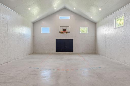 Incredible 35x70 finished Recreation Building featuring INDOOR basketball/sport court, golf zone, gaming & entertainment areas, Kitchenette, Baths, storage/hobby space & room for vehicles, toys or collections