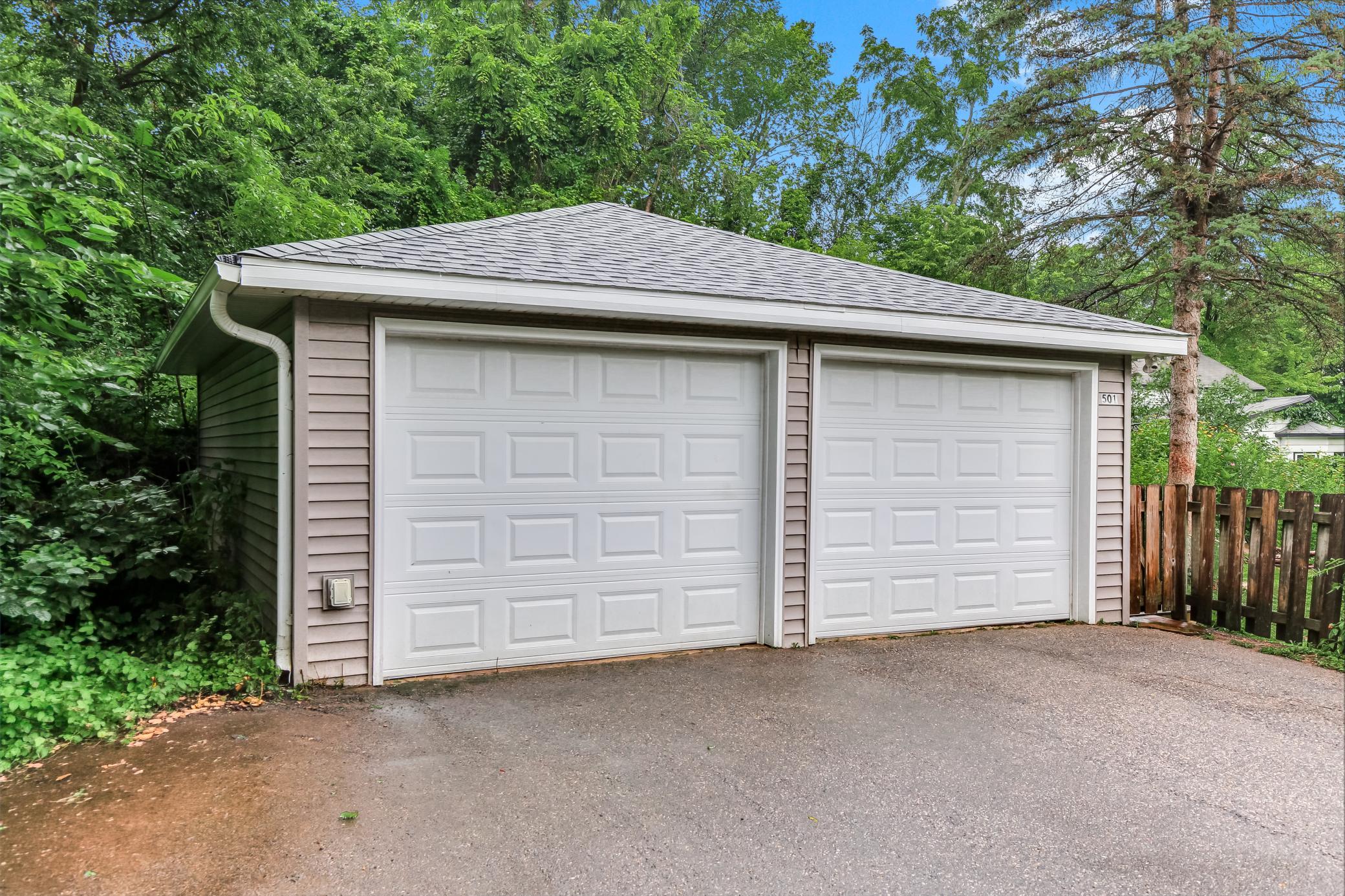 Detached Garage with brand new roof. Lots of space for storage!